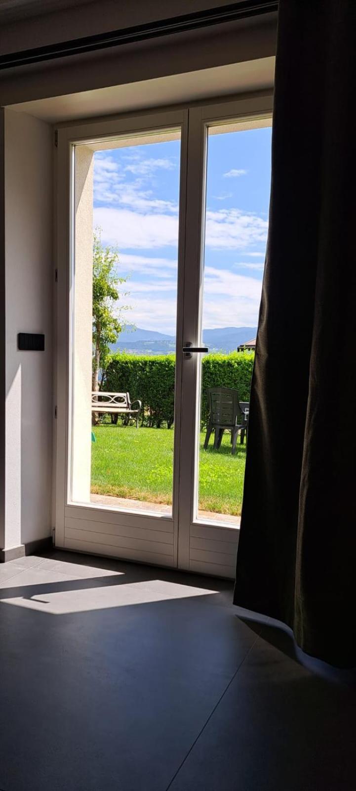 Il Nido Del Peller Apartment Cles Bagian luar foto